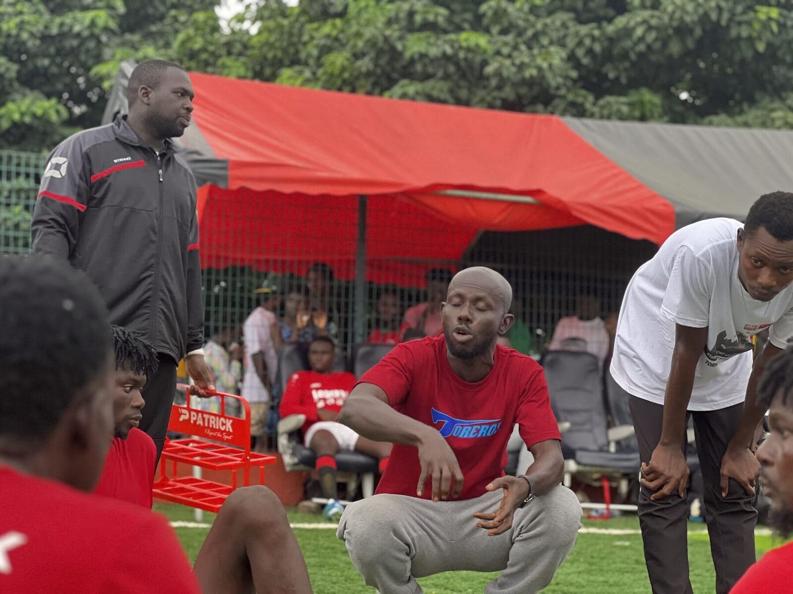 Coach talking to his team during the break