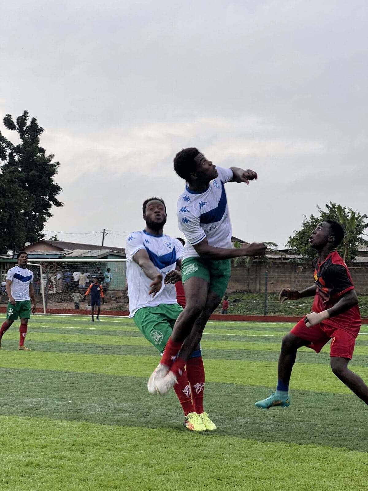Players jumping for a header
