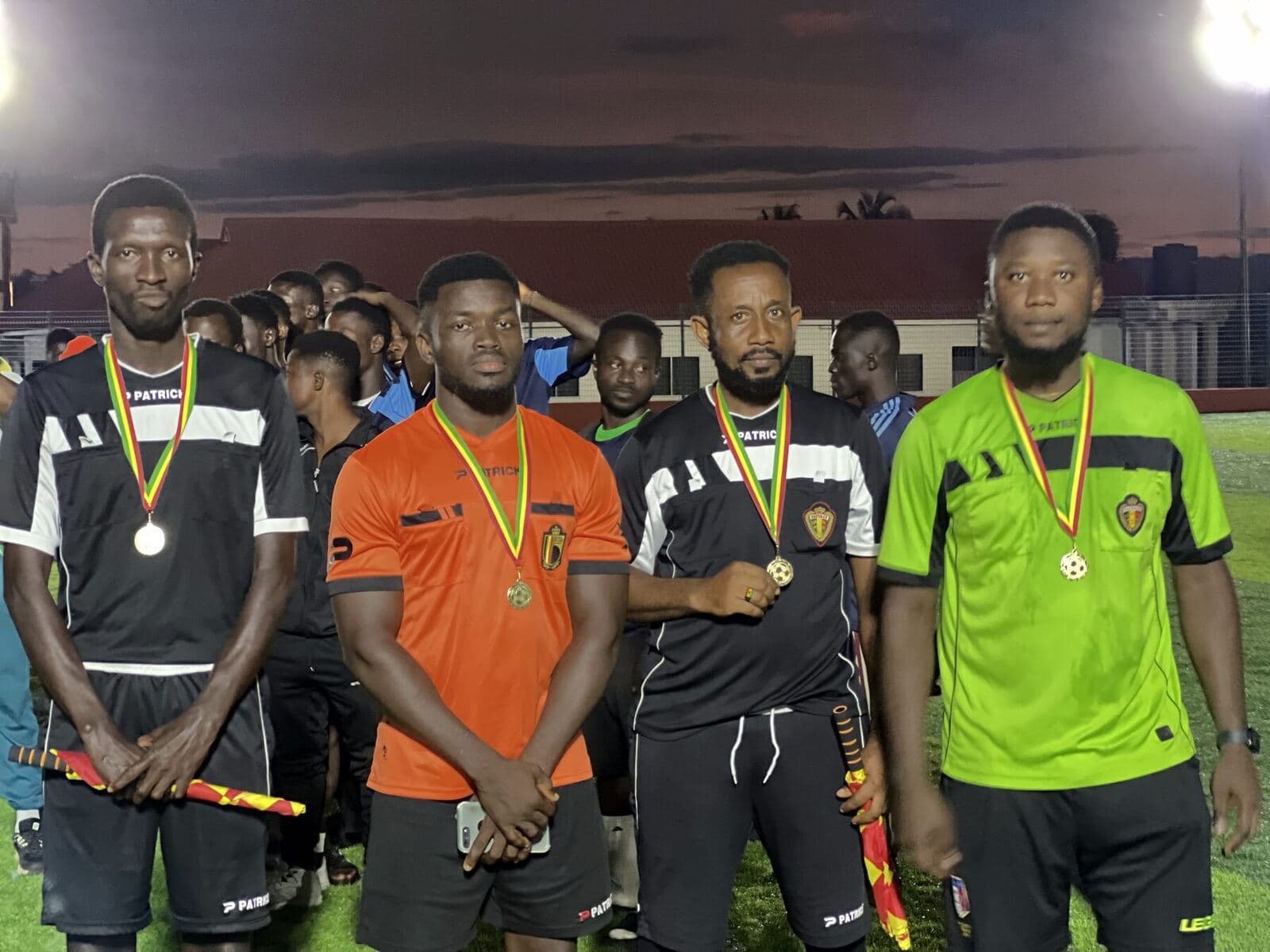 Referees with their medals