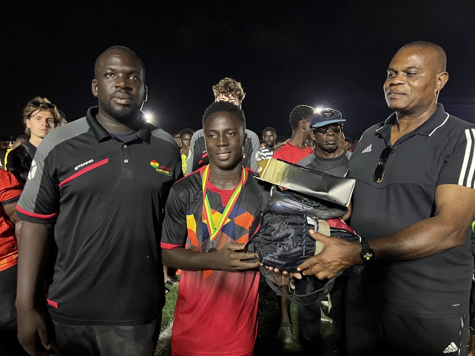 Player receiving a prize on finals night